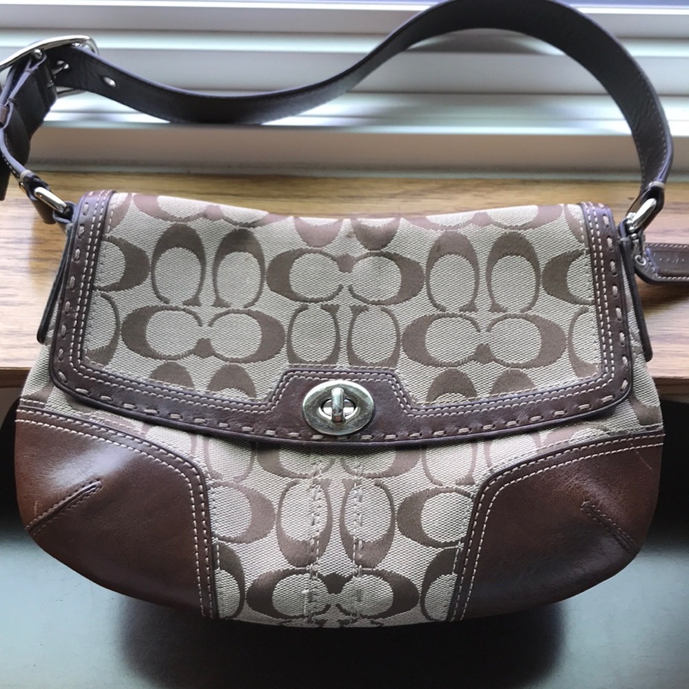 Coach signature brown purse with leather accents